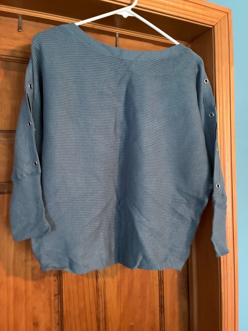 Jennifer Lopez Blue Crewneck Sweater with Grommet Sleeve Detail